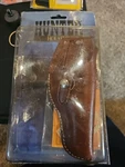 Hunter 2200-2 Sure -fit Leather Holster Medium Autos 3-4" Barrel". Fixed Price $36.00.